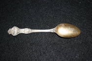 Arkansas themed spoon with OSH on it