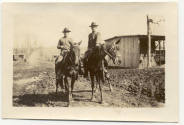 2 unidentified soldiers on horseback at Camp Pike