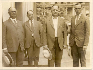 Photo of Gov. Terral accompanied by officers in the State Militia 