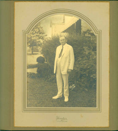 Photo of Joe T. Robinson in a white suit