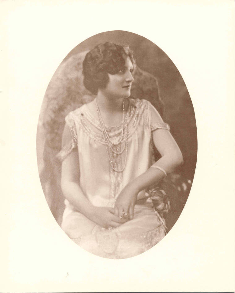 Portrait of Mrs. Terral wearing inaugural ball gown & 3 necklaces