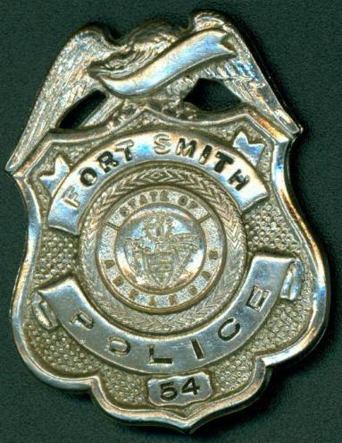 Silver badge from the Fort Smith Police.