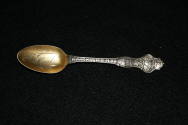 Arkansas theme spoon with OSH on it