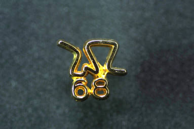 Rockefeller tie tack