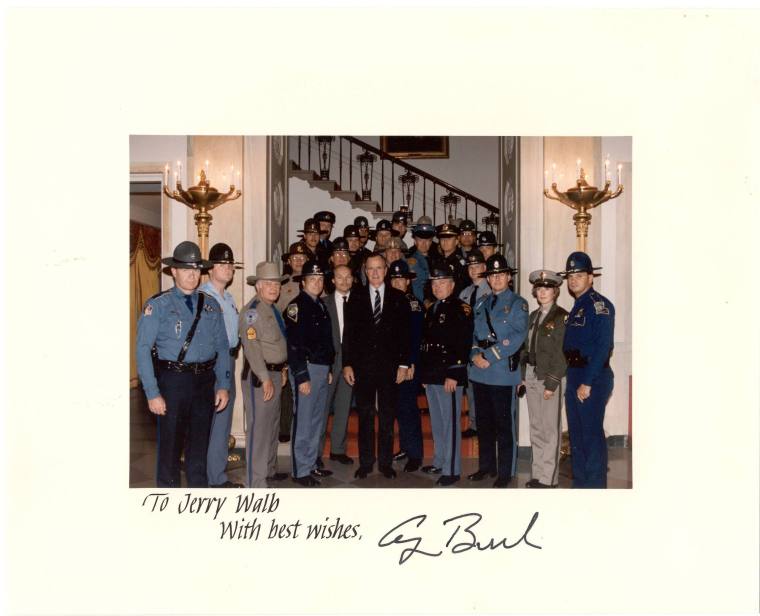 photo of Pres. George Bush, Sr. with State police