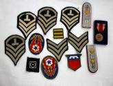 George Fisher patches, pins, buttons, coins