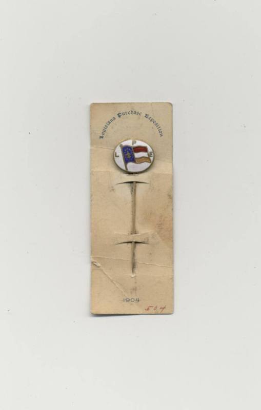 1904 World's Fair stick pin and label