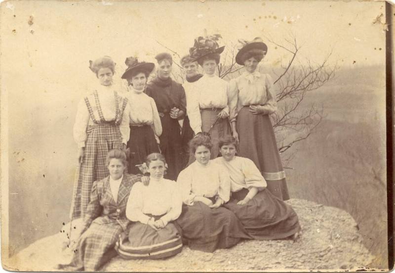 photo postcard of women on mountain top