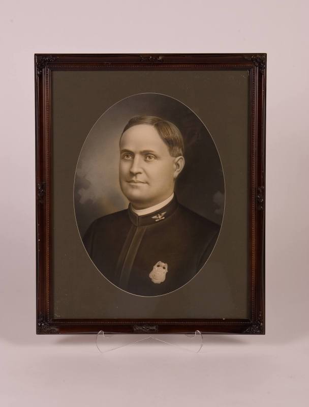 Framed photo of L.R. Chief of Police B.C. Rotenberry