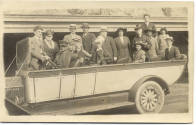 Postcard of Group of People in Car