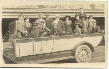 Postcard of Group of People in Car