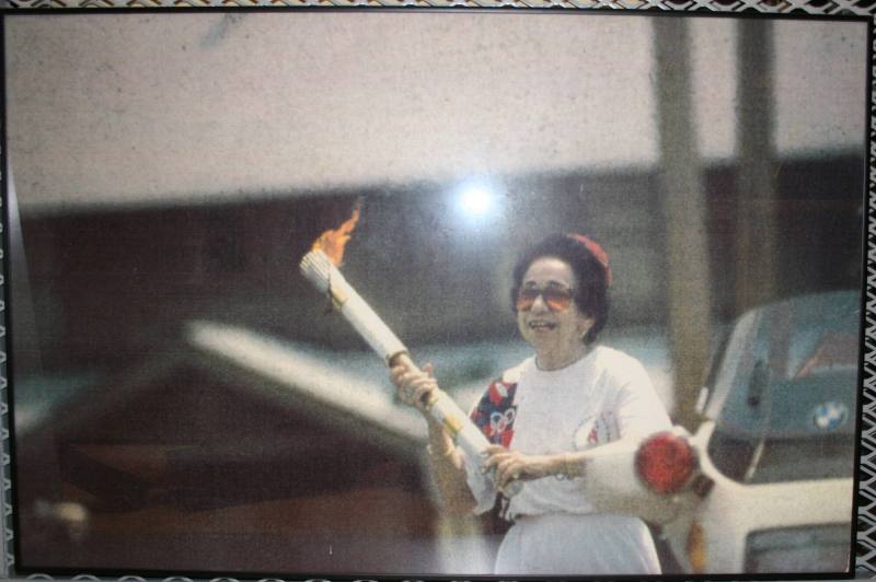 Photo of Willie carrying Olympic Torch