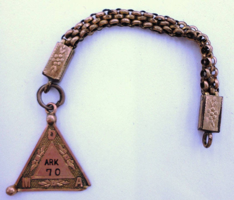 Emblem, "ARK 70" on a chain - Mary Burt Brooks