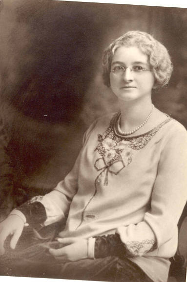 Photo of Mrs. Parnell wearing a scoop-neck blouse