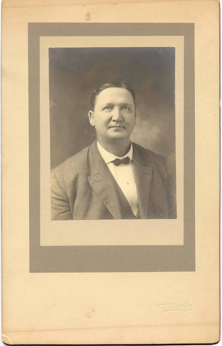 Close-up photo of Jeff Davis in suit and bow tie