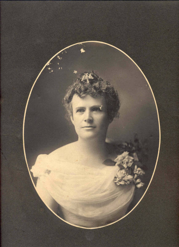 Ima Davis, wife of Gov. Jeff Davis, wearing light colored dress