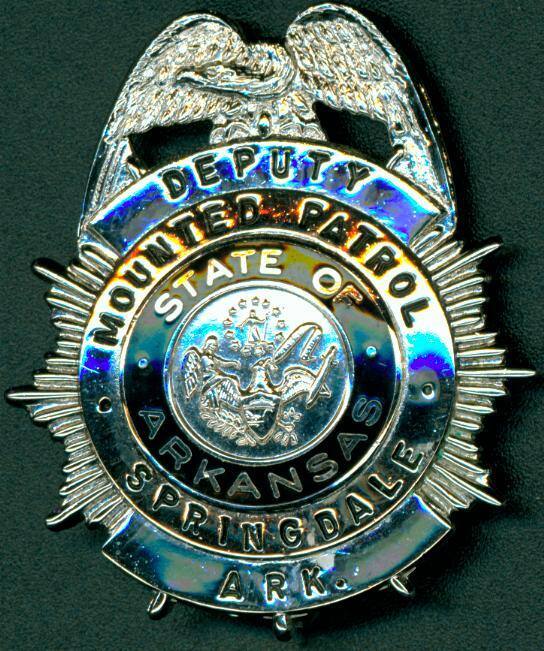 Silver badge from Springdale, Arkansas.