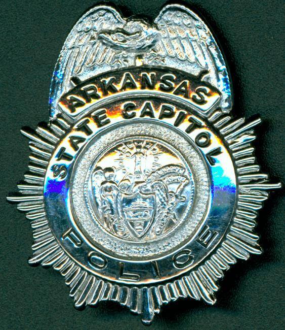 Small silver (chrome plated) badge for the State Capitol Police.