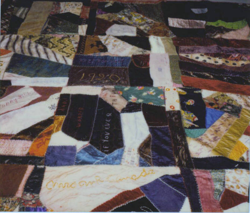 Crazy quilt with variety of designs and patches