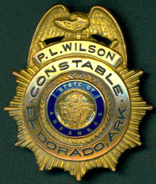 Badge for "P.L. Wilson" Constable in El Dorado, Arkansas.