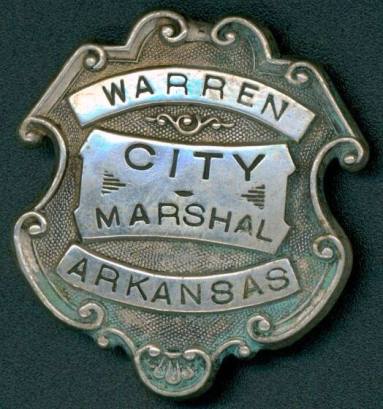 Badge worn by the Warren, Arkansas City Marshal.