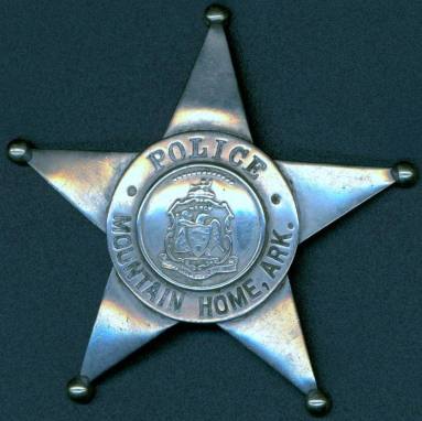 Badge from Mountain Home, Arkansas Police. 