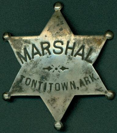 Marshal's badge front Tonitown, Arkansas.