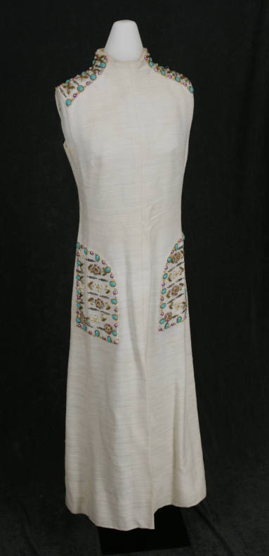 Betty Bumpers' full length, sleeveless ivory dress