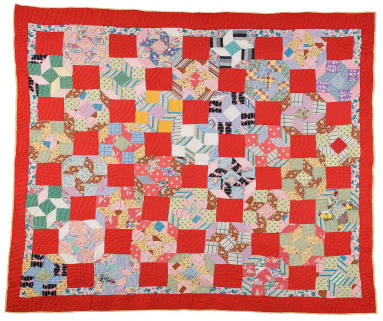 Red and yellow patchwork quilt made by Areillian Reed